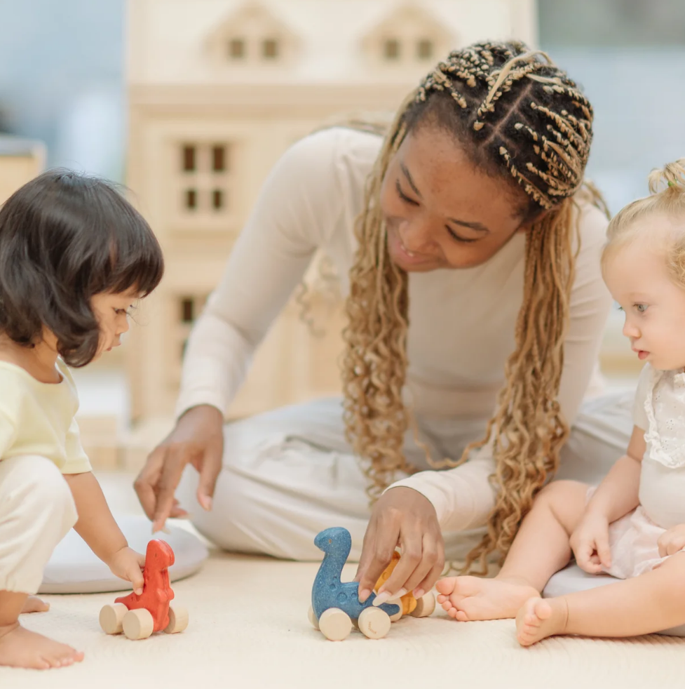 Plan Toys - Montessori-Inspired Dino Stego Car